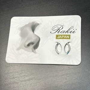 Rakii new in package blue 16 gauge 1.0 mm hoop ring. Nose ring, cartilage ring